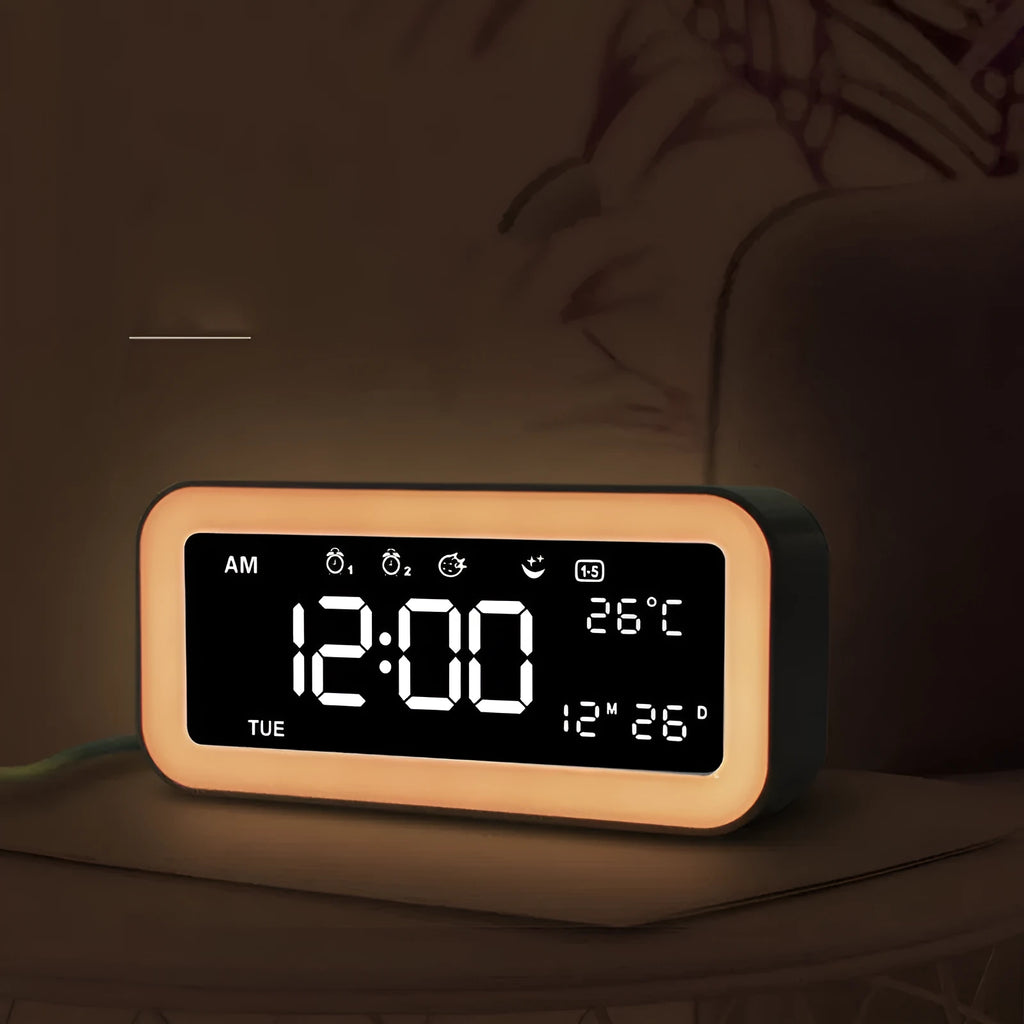 Rectangular blue LED alarm clock with quartz glass display and multicoloured atmosphere lighting functions