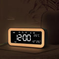 Rectangular blue LED alarm clock with quartz glass display and multicoloured atmosphere lighting functions