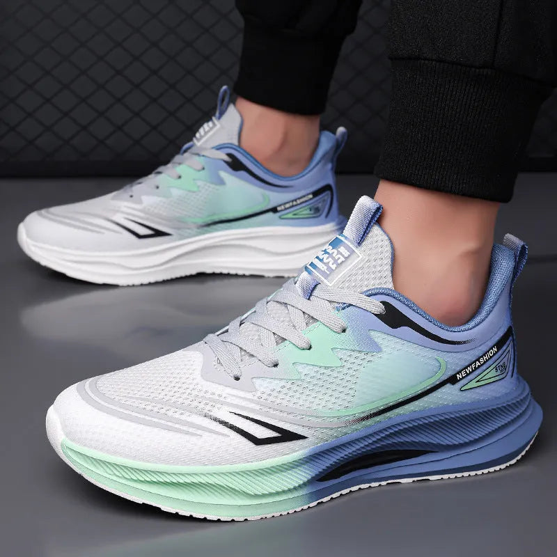 Men's solid colour casual shoes with mesh upper and rubber sole in black, blue, gray, and green options.