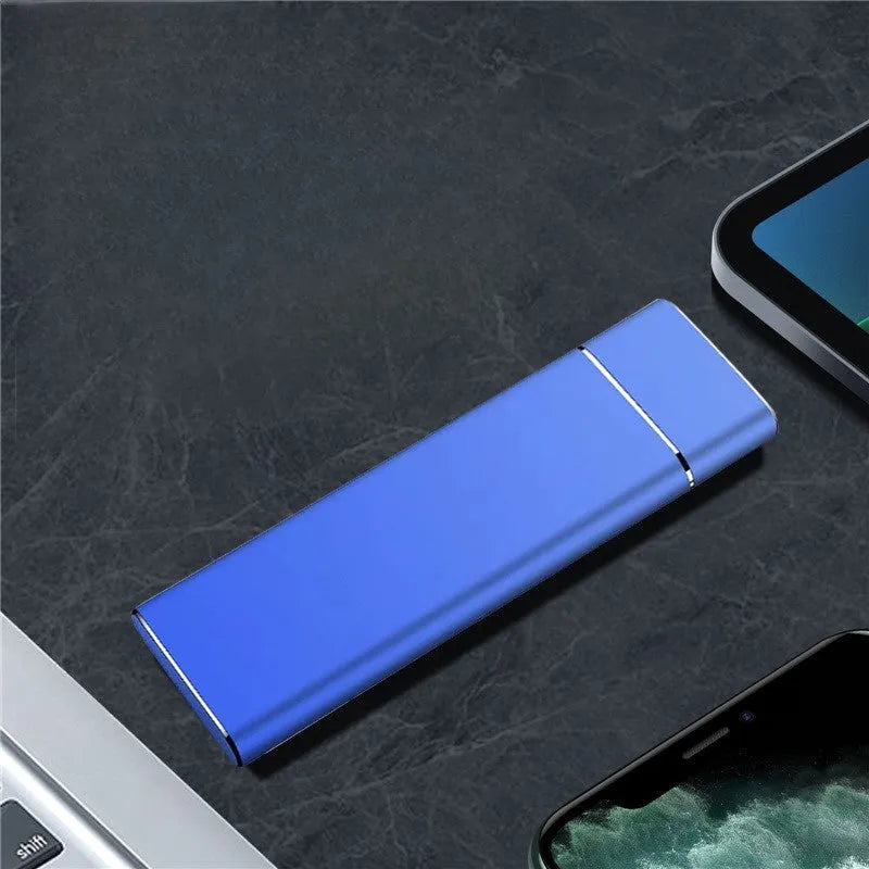 Sapphire blue metal portable solid state external hard drive with USB cable