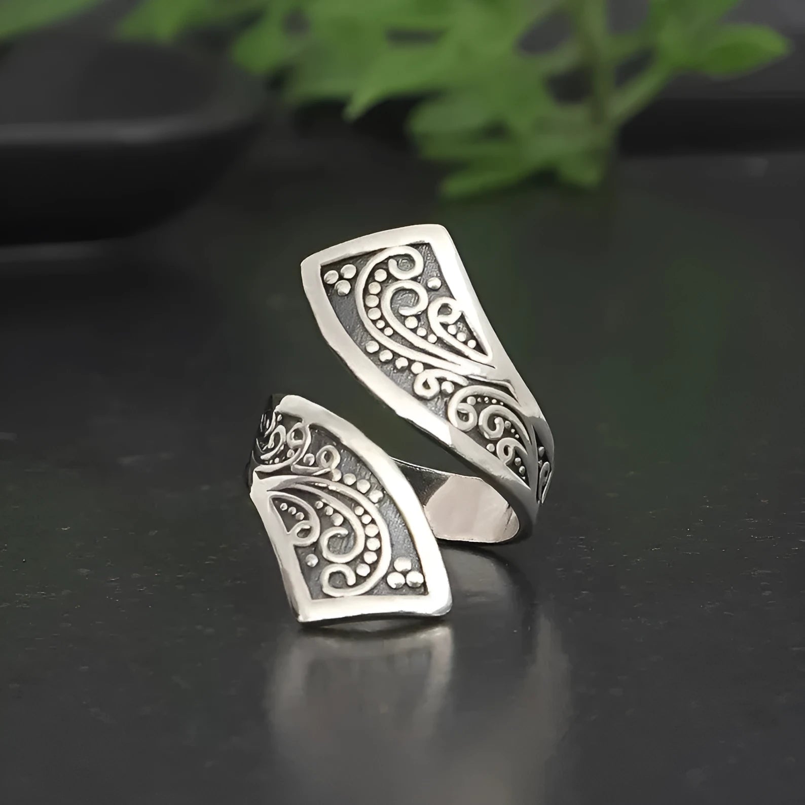 Silver-colour adjustable opening women's ring with retro minimalist design on white background
