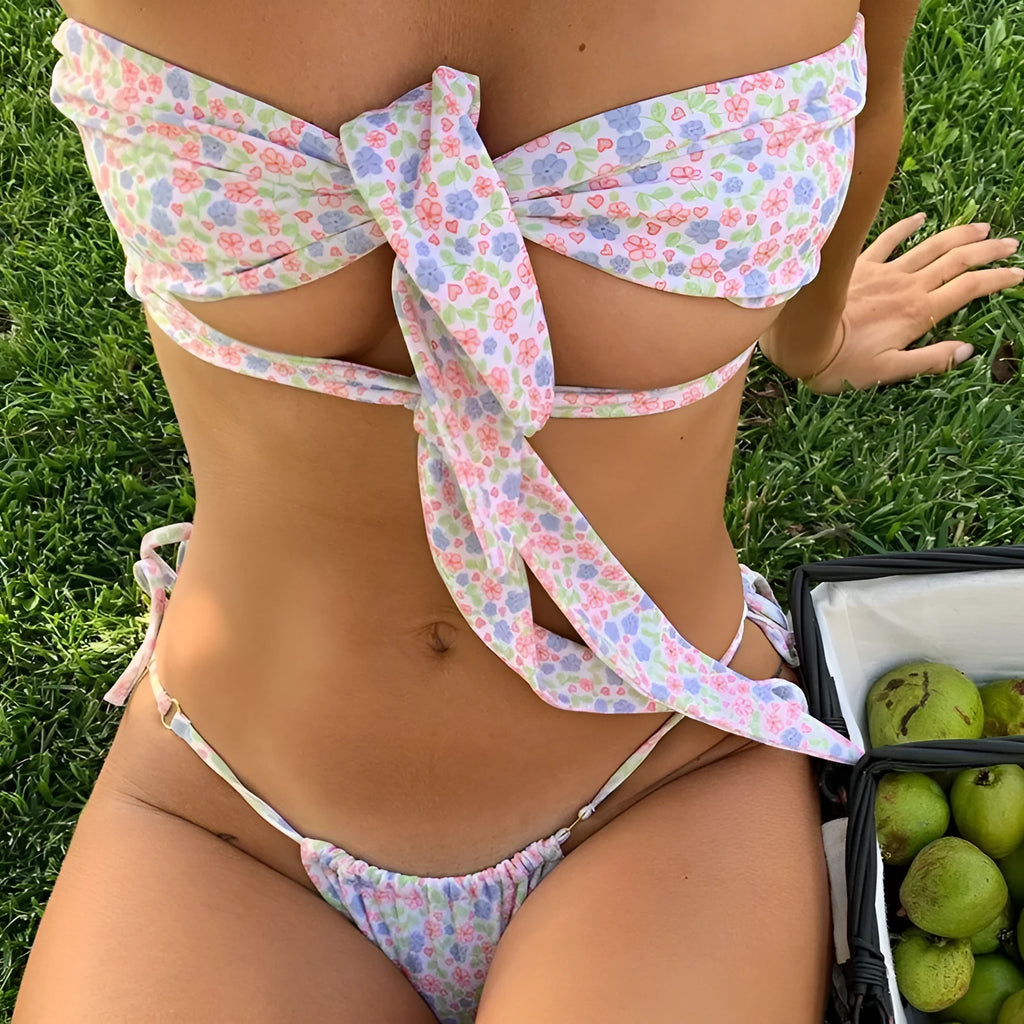 Women's swimsuit with lace-up front and chest padding in floral print design
