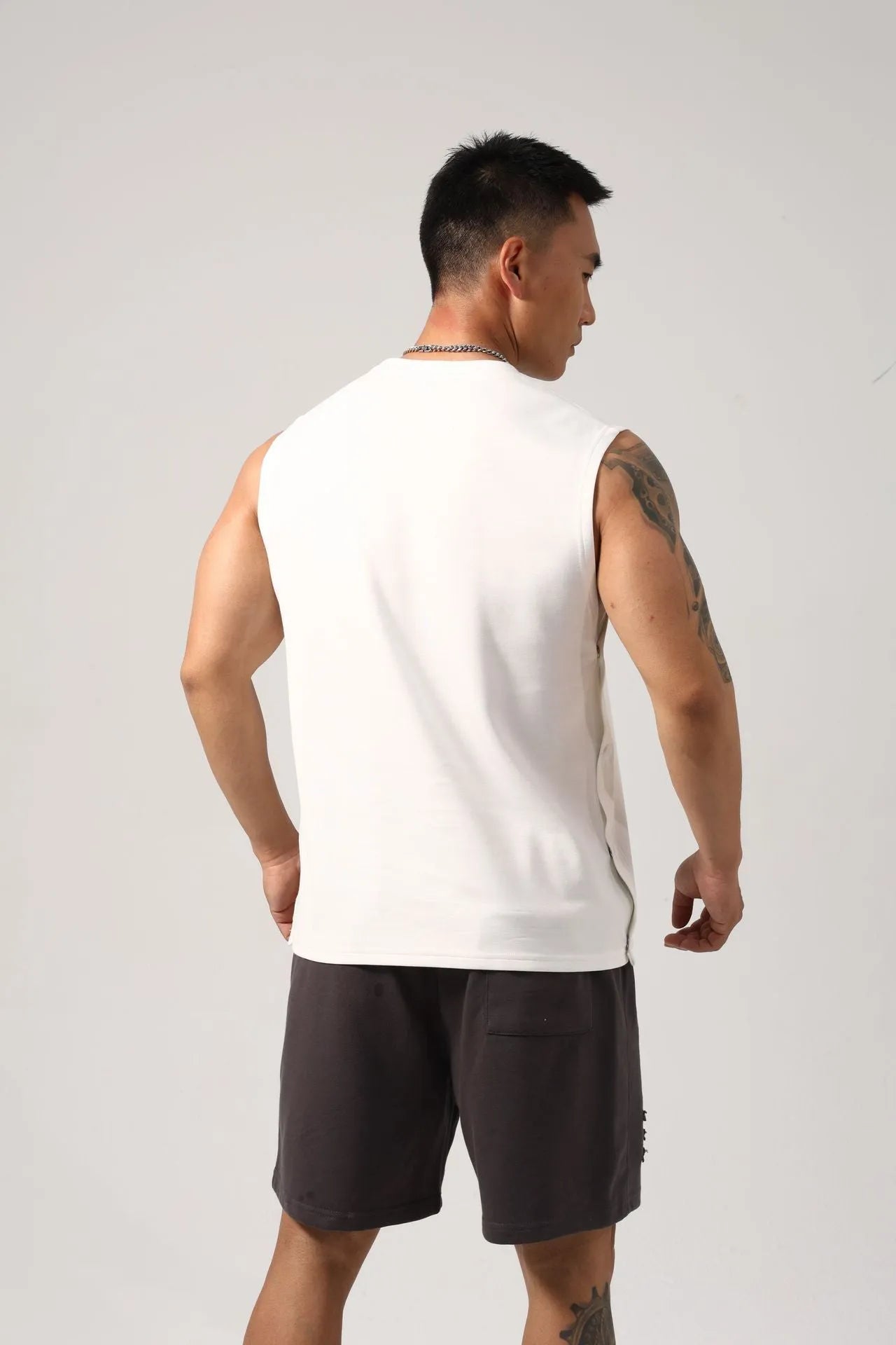 Men's loose cotton fitness vest with hidden hook side openings in black colour