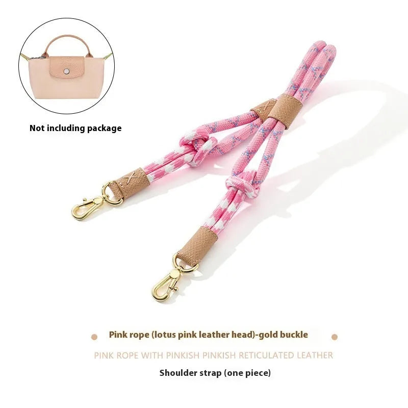 Braided nylon and cowhide leather crossbody shoulder strap with gold alloy buckle on a grey background.