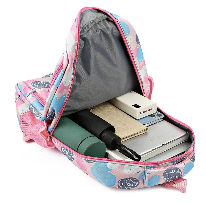 Blue children's school backpack with air pillow shoulder belts and large capacity storage compartments