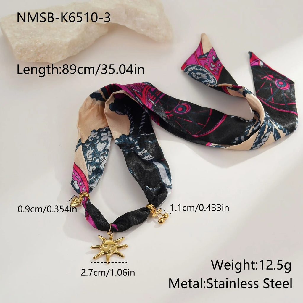 Stainless steel geometric pendant necklace with 18K gold electroplated finish on adjustable chain