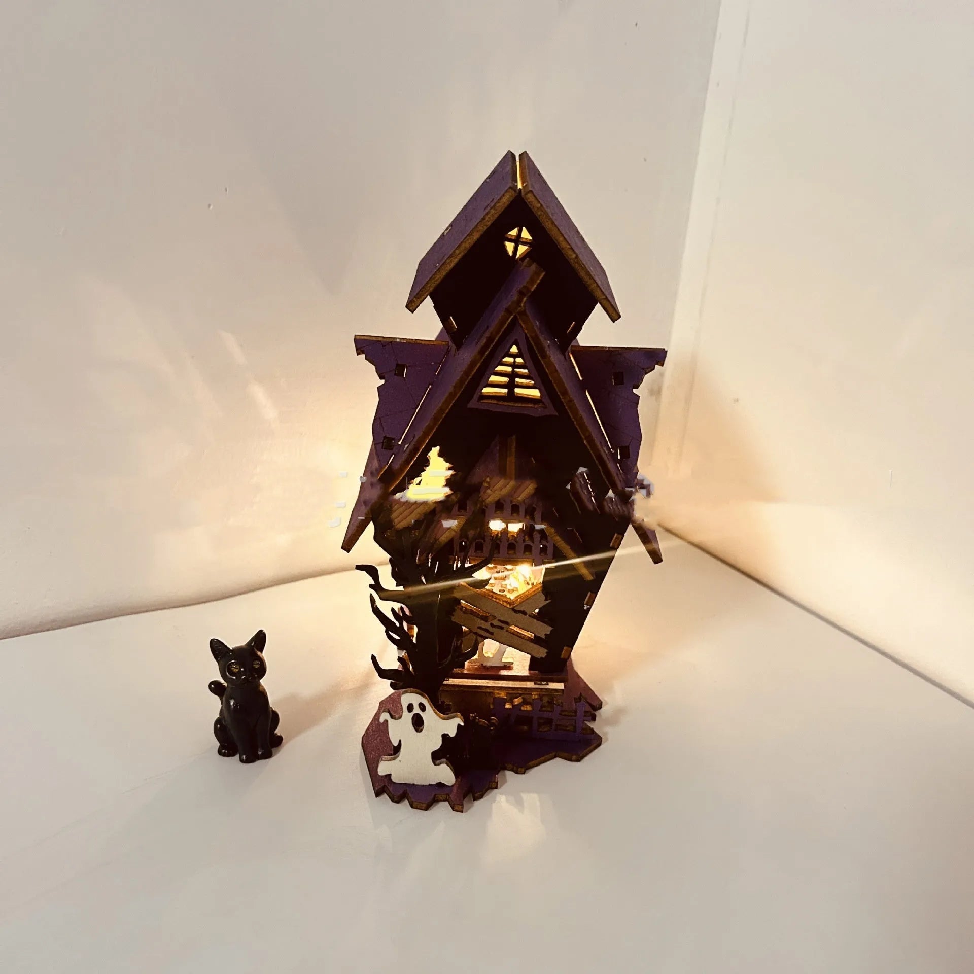 Wooden DIY haunted house decoration kit for Halloween with dimensions 14cm by 10.5cm by 19cm