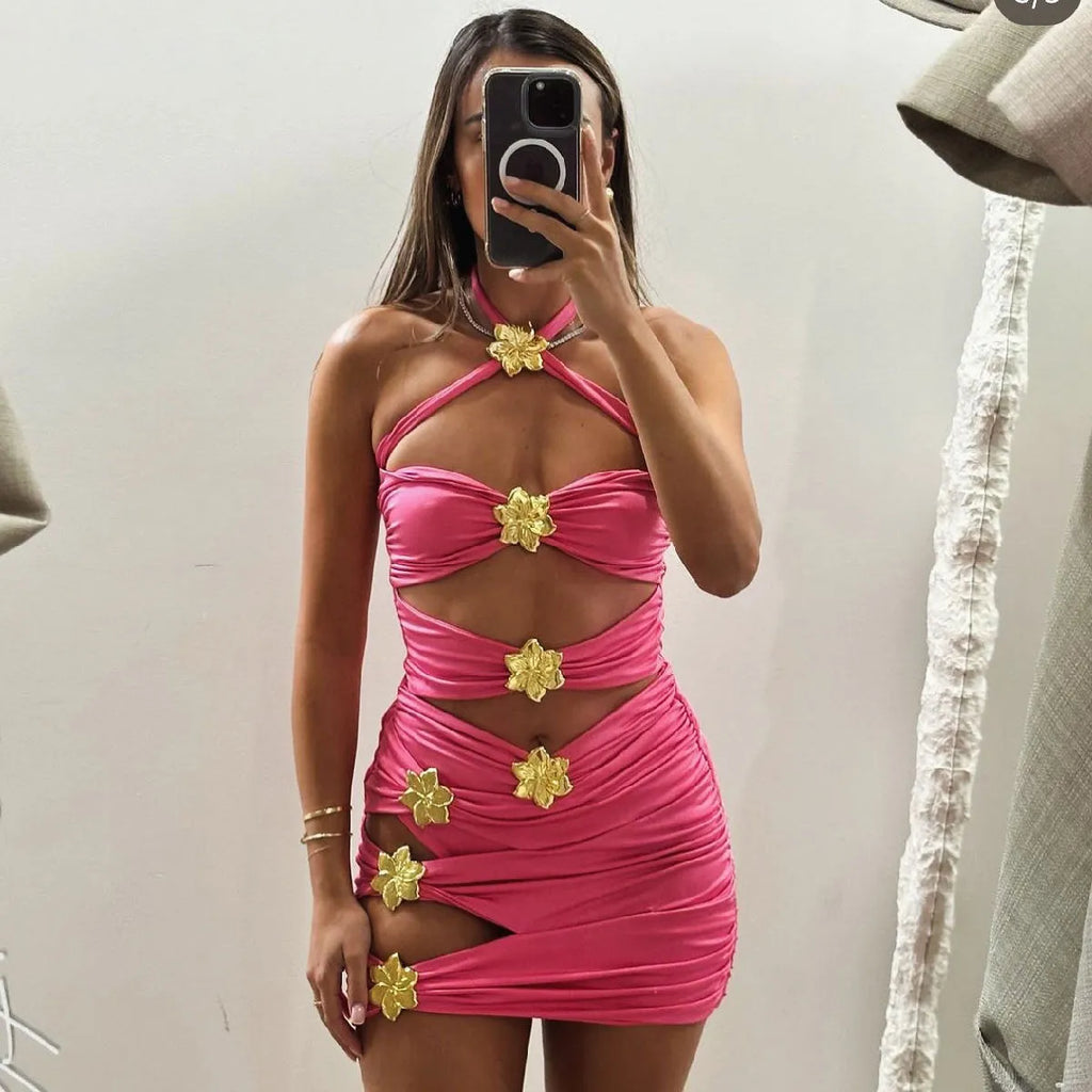 Women's solid colour one-piece swimsuit with a short skirt and hollow-out tube top design.