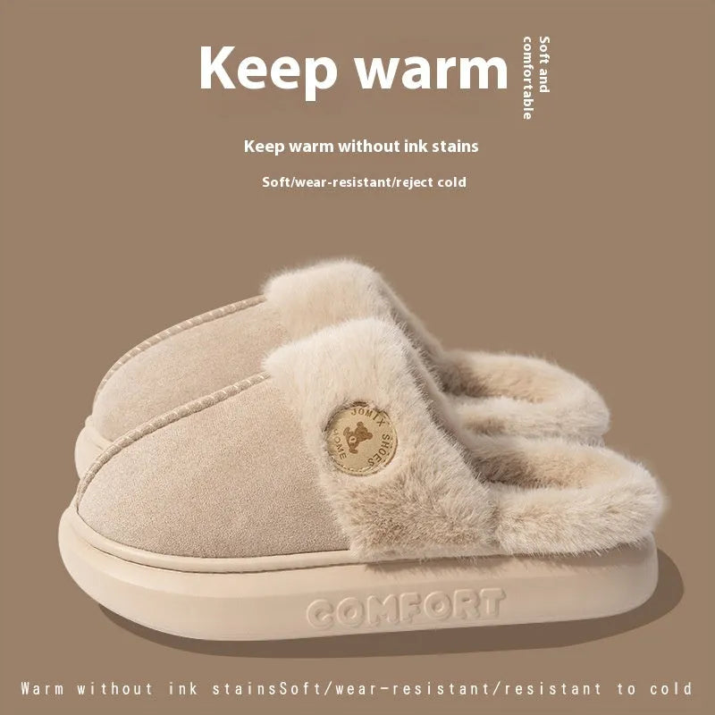 A pair of plush fleece slippers with a thick PVC sole and car stitching detail, shown in a choice of colours.