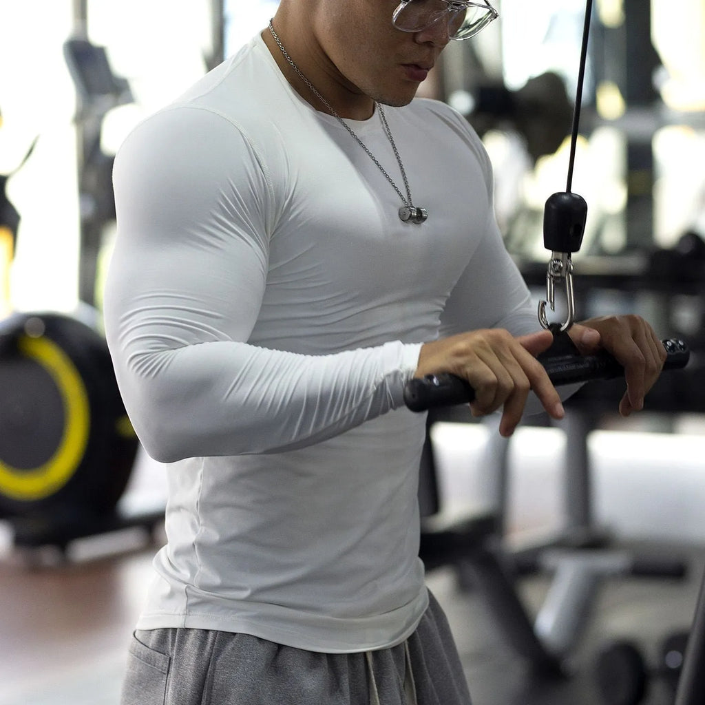 Men's long sleeve fitness tights in black or white solid colour athletic compression wear