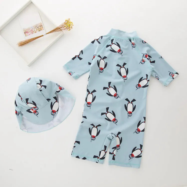 Boys' penguin print long-sleeve one-piece swimsuit with matching swimming cap