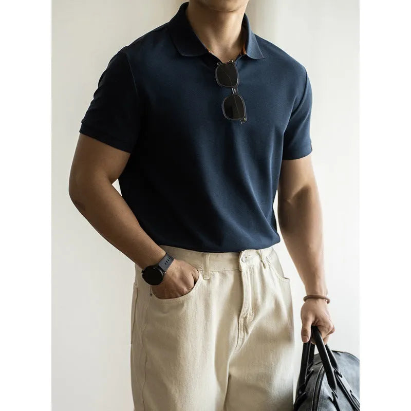 American-style short-sleeve polo shirt in blue, black, or white cotton-polyester blend.