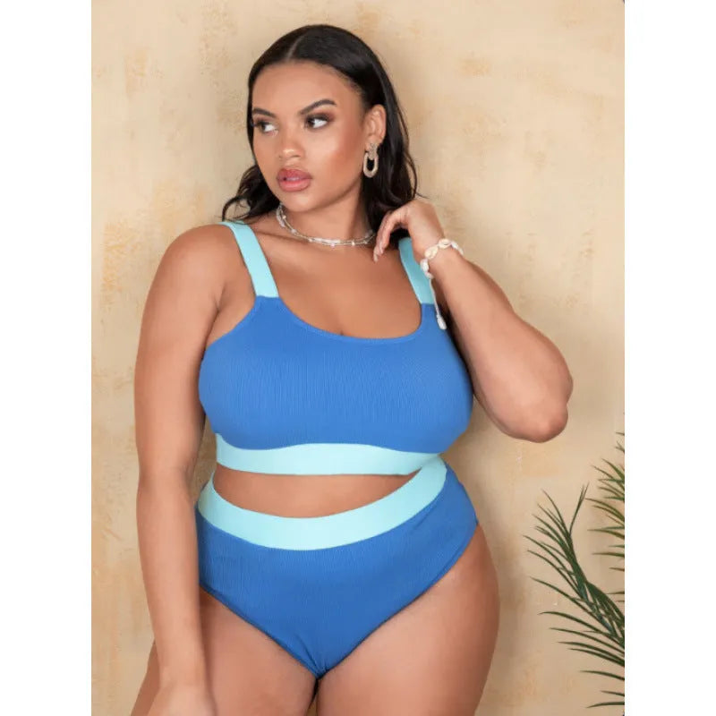 Women's high waisted polyester bikini swimsuit with split sides and intricate stitching details in solid colour