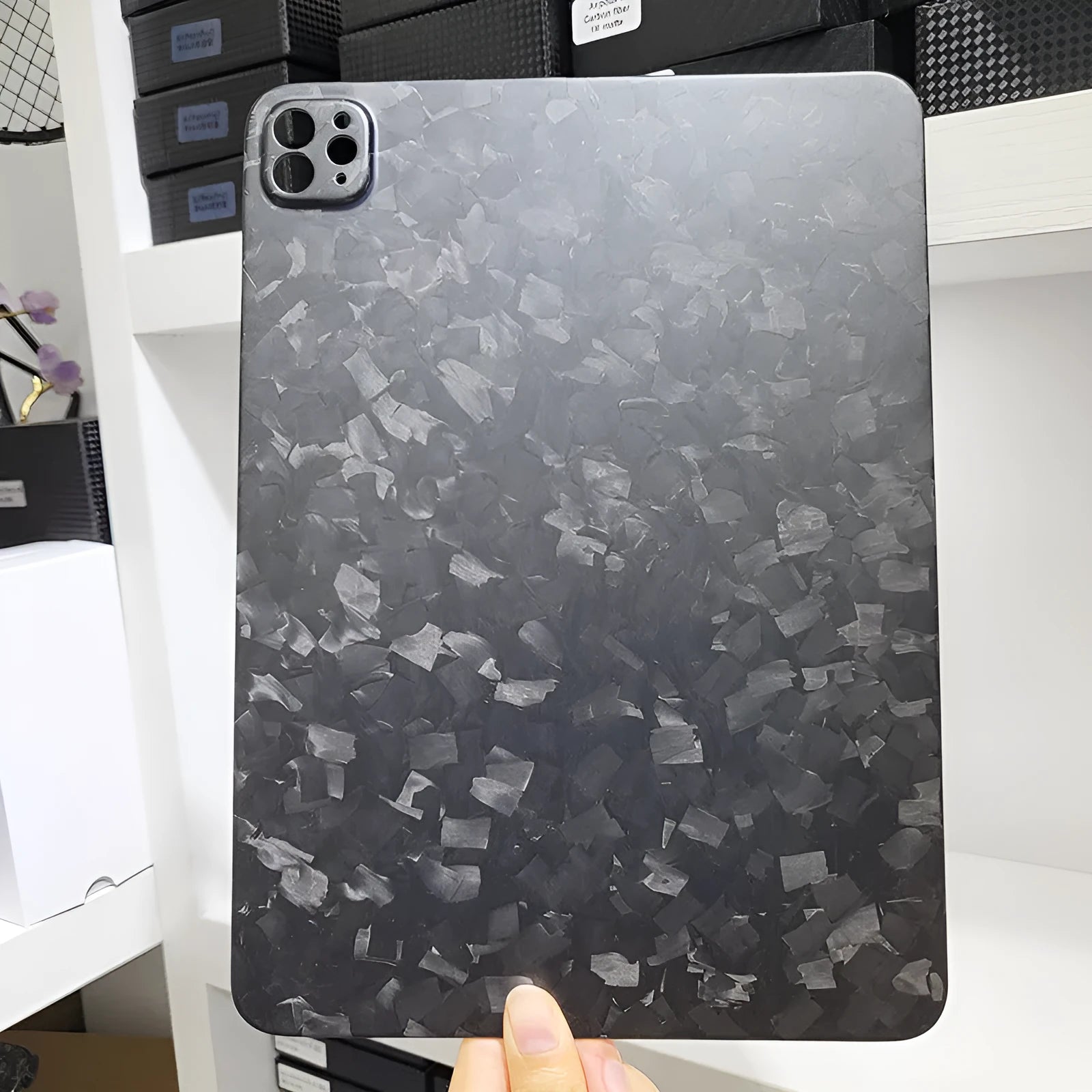 Real carbon fibre hard protective case for Apple iPad Pro 11 with a plaid embossed pattern.
