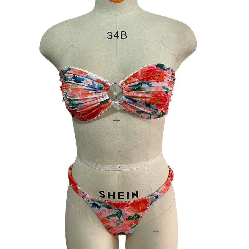 Women's tube top bikini set with lace trim in blue, yellow, pink, and floral print colours.